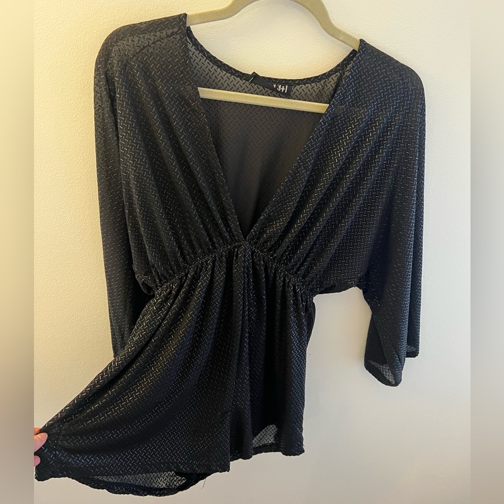 Black textured romper.